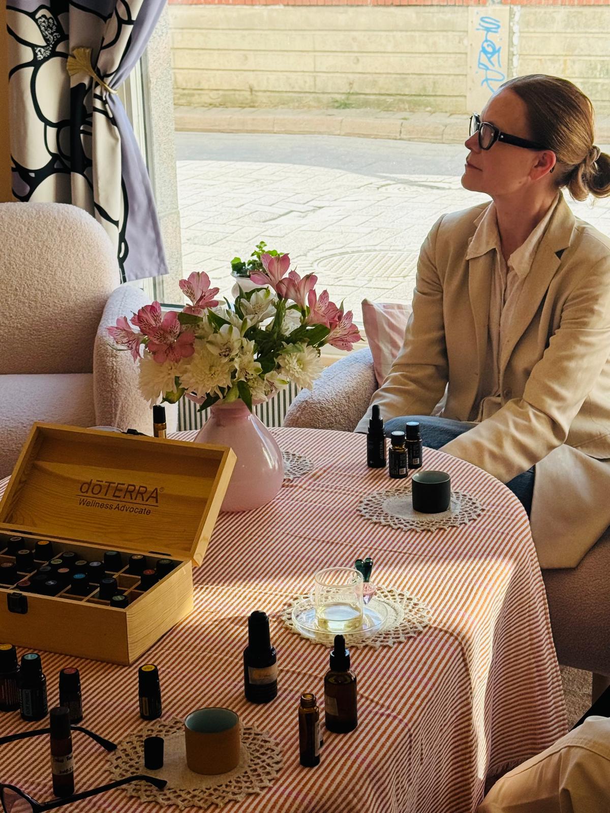 Participant exploring essential oils during the workshop